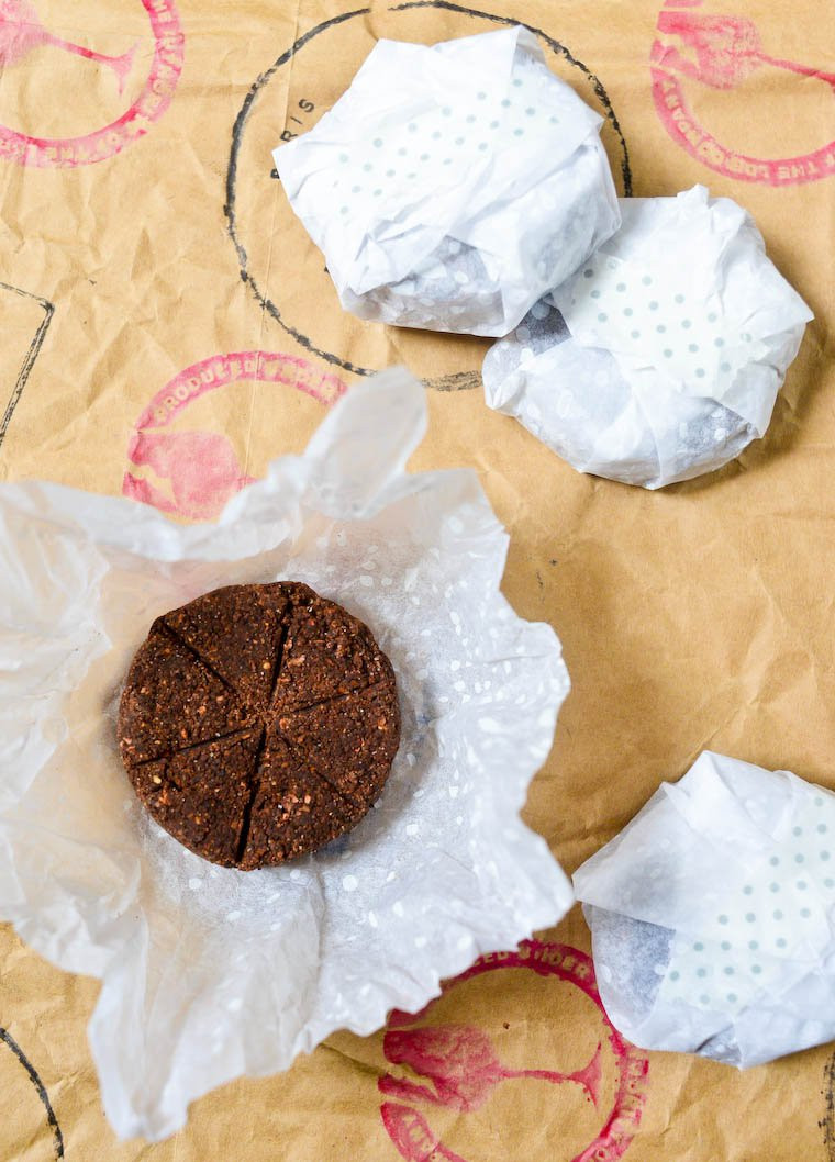 Close-up of broken Mexican chocolate discs showing coarse texture