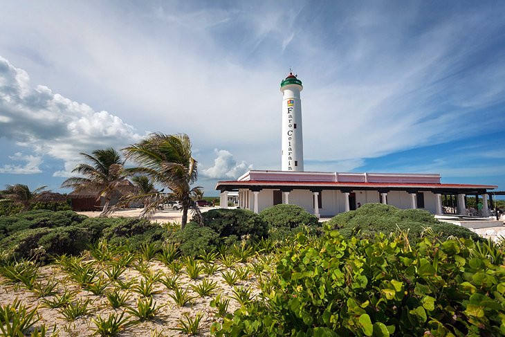 Historic Celarain Lighthouse against a blue sky in Cozumel