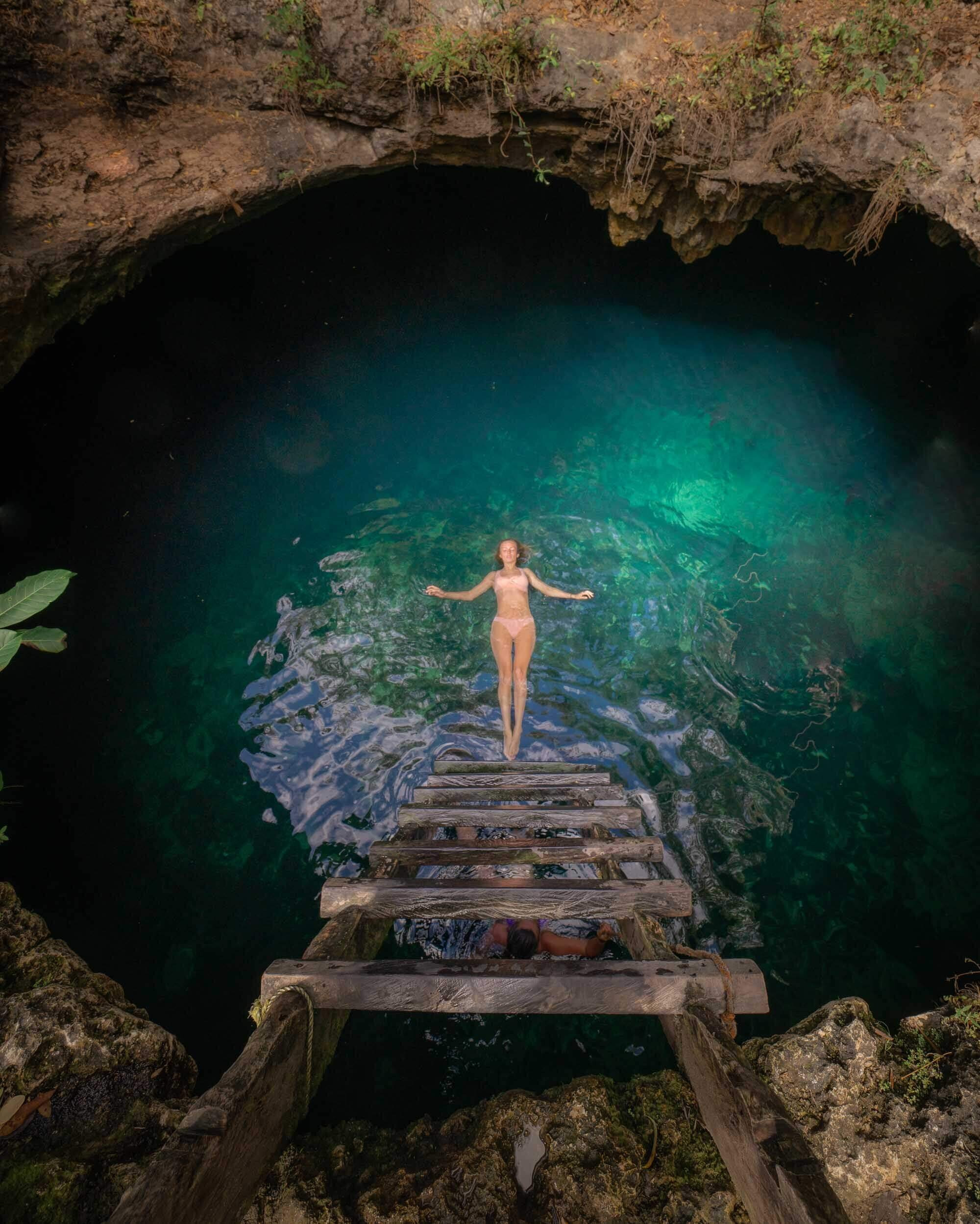 Cenote Calavera near Tulum, Yucatan Peninsula, known for its popularity and potential crowds – arriving early is highly recommended.