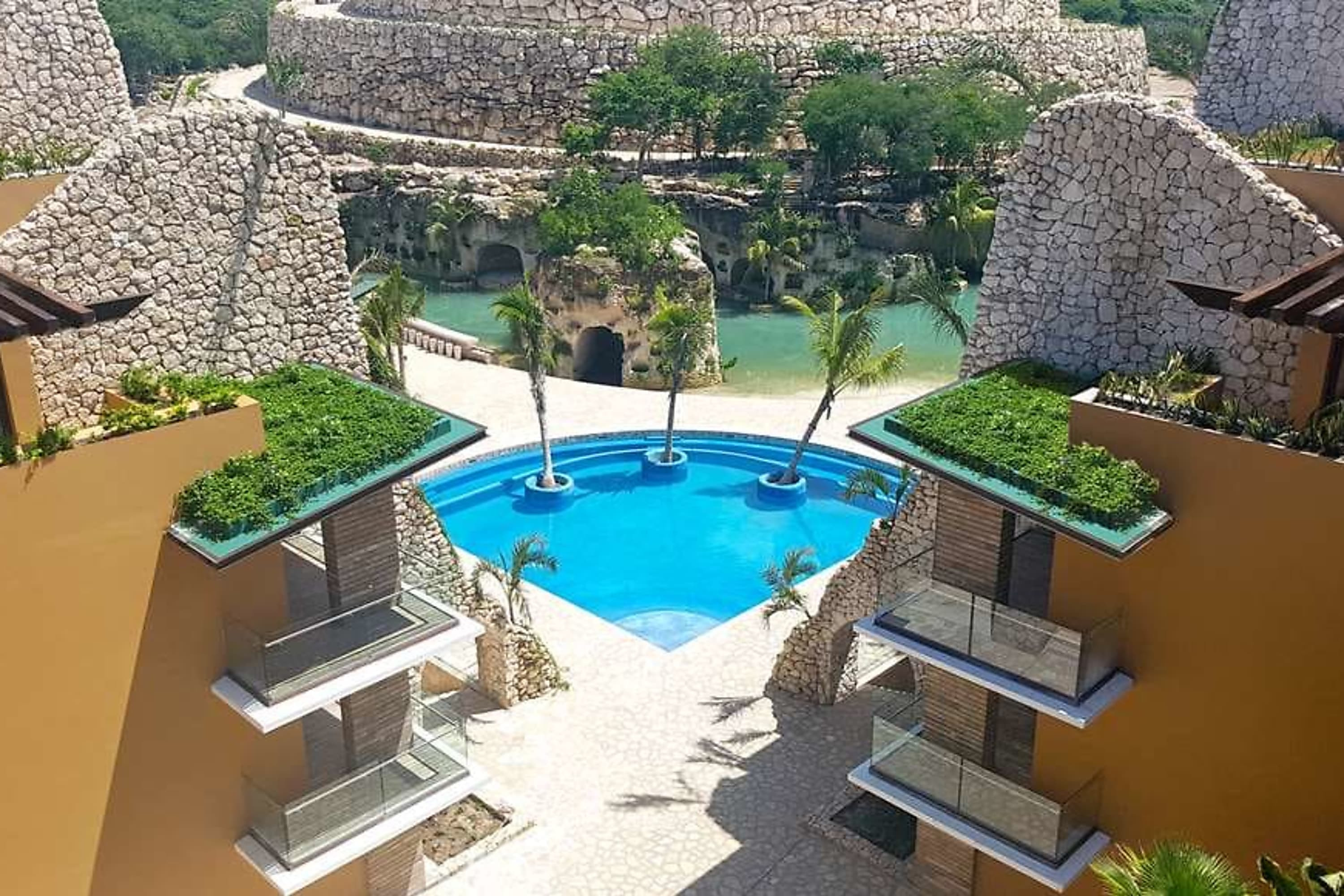 Indigenous architecture inspires the design of Hotel Xcaret Mexico, with rooftop gardens and stacked-stone walls used as accents 