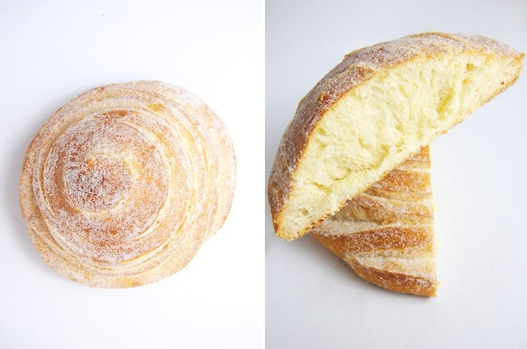 A Novia pan dulce, showcasing its swirl shape and sugary topping.