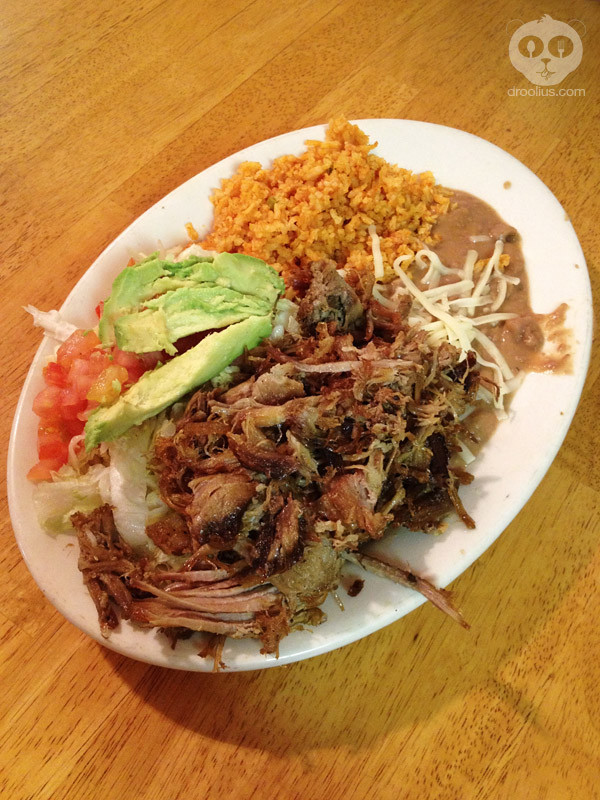 Orden de carnitas from El Charro Mexican Restaurant in Arcadia, FL, a flavorful Mexican pork dish often enjoyed during New Year celebrations for prosperity.