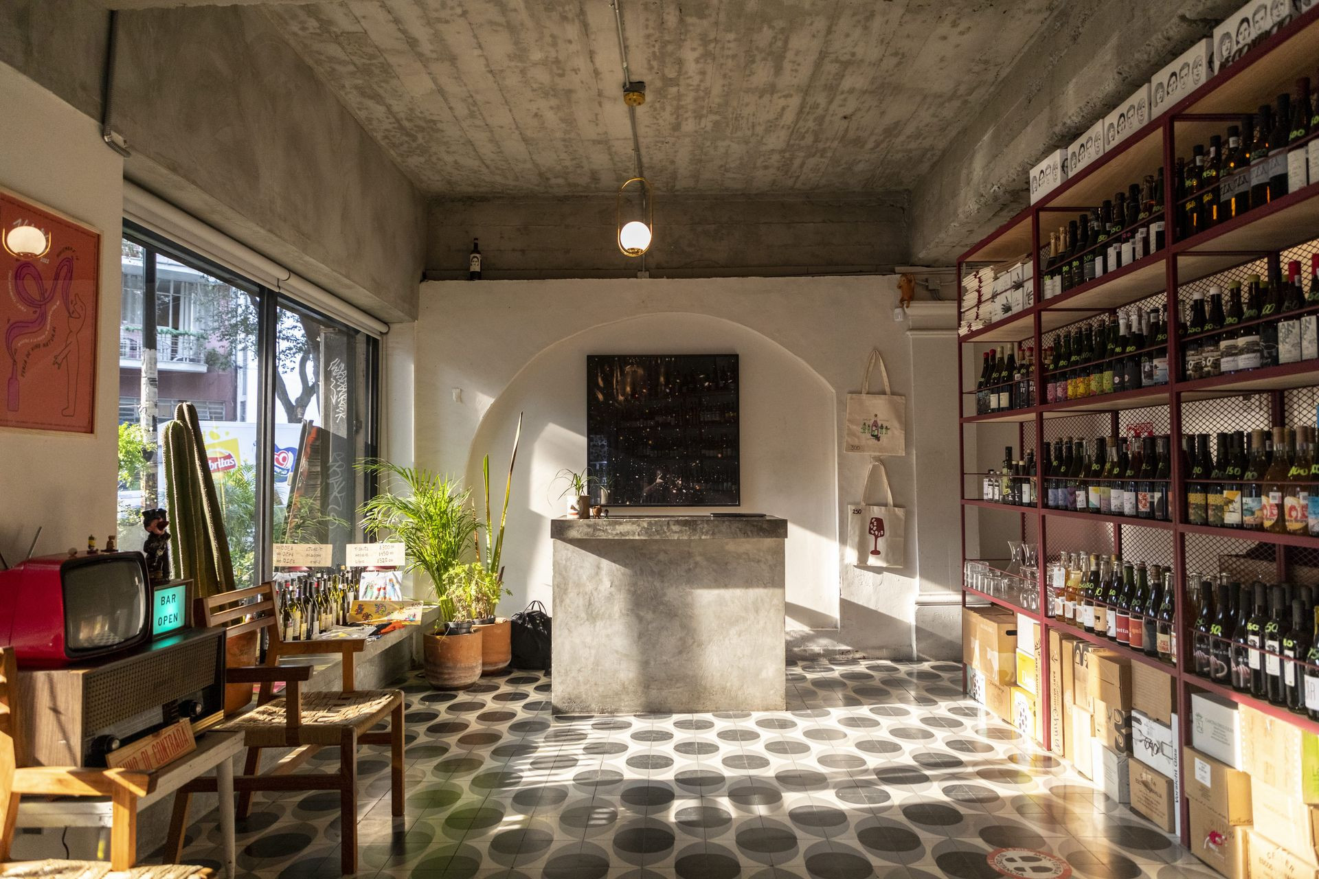 Interior of Escorpio wine shop in Mexico City, featuring a curated selection of wines and a relaxed atmosphere