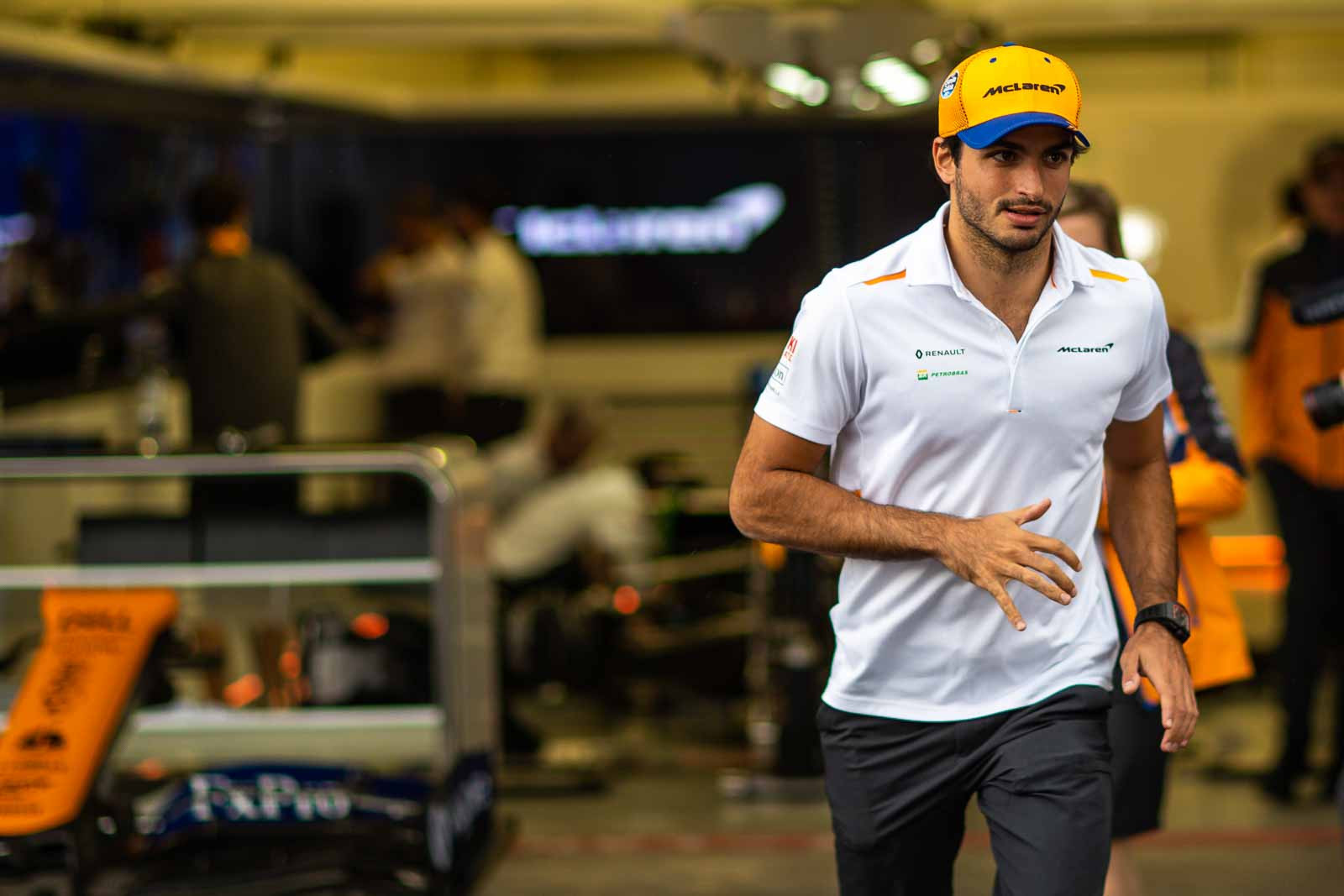 Carlos Sainz Jr. joins Lando Norris for an autograph session in the pit lane at the Mexican Grand Prix