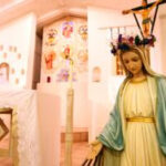 San Ysidro Church in Corrales, New Mexico, showcasing historic adobe architecture and its role as a venue for community events.