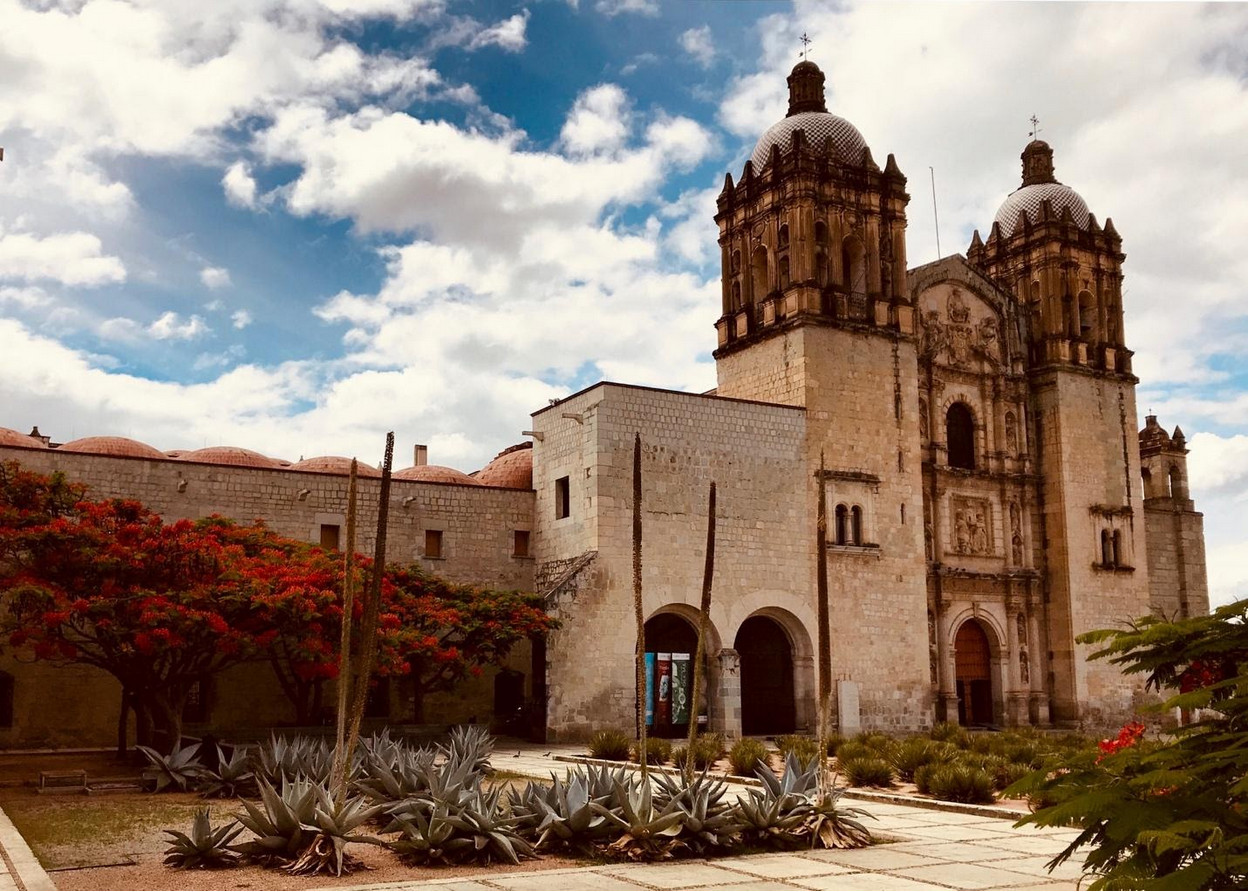 Oaxaca church with clock tower in sunny weather