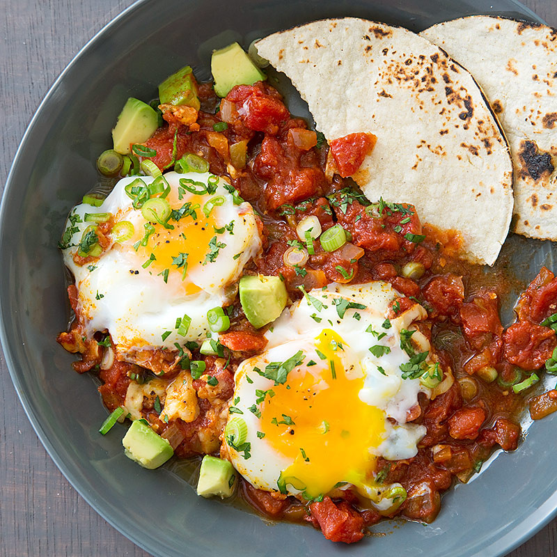 Delicious Huevos Rancheros topped with vibrant Salsa Ranchera, a perfect Mexican brunch dish.