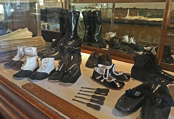 Antique shoe display at the Tunstall Store Museum in Lincoln, New Mexico