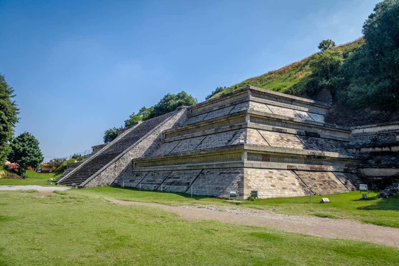 The Great Pyramid of Cholula, an ancient Mesoamerican pyramid and one of the largest pyramids in the world by volume, appearing as a natural hill in the landscape.