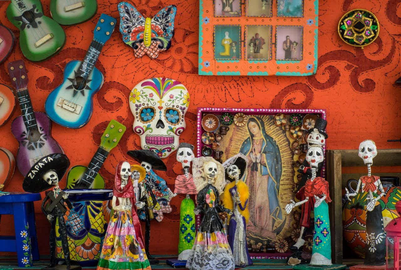 Iconic La Catrina figures, symbols of the Day of the Dead celebrations in Mexico, originally a satirical figure.