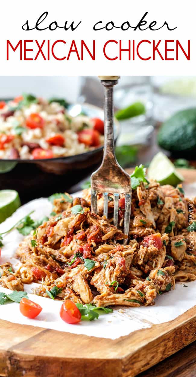 Shredded Mexican Chicken on a wood cutting board.