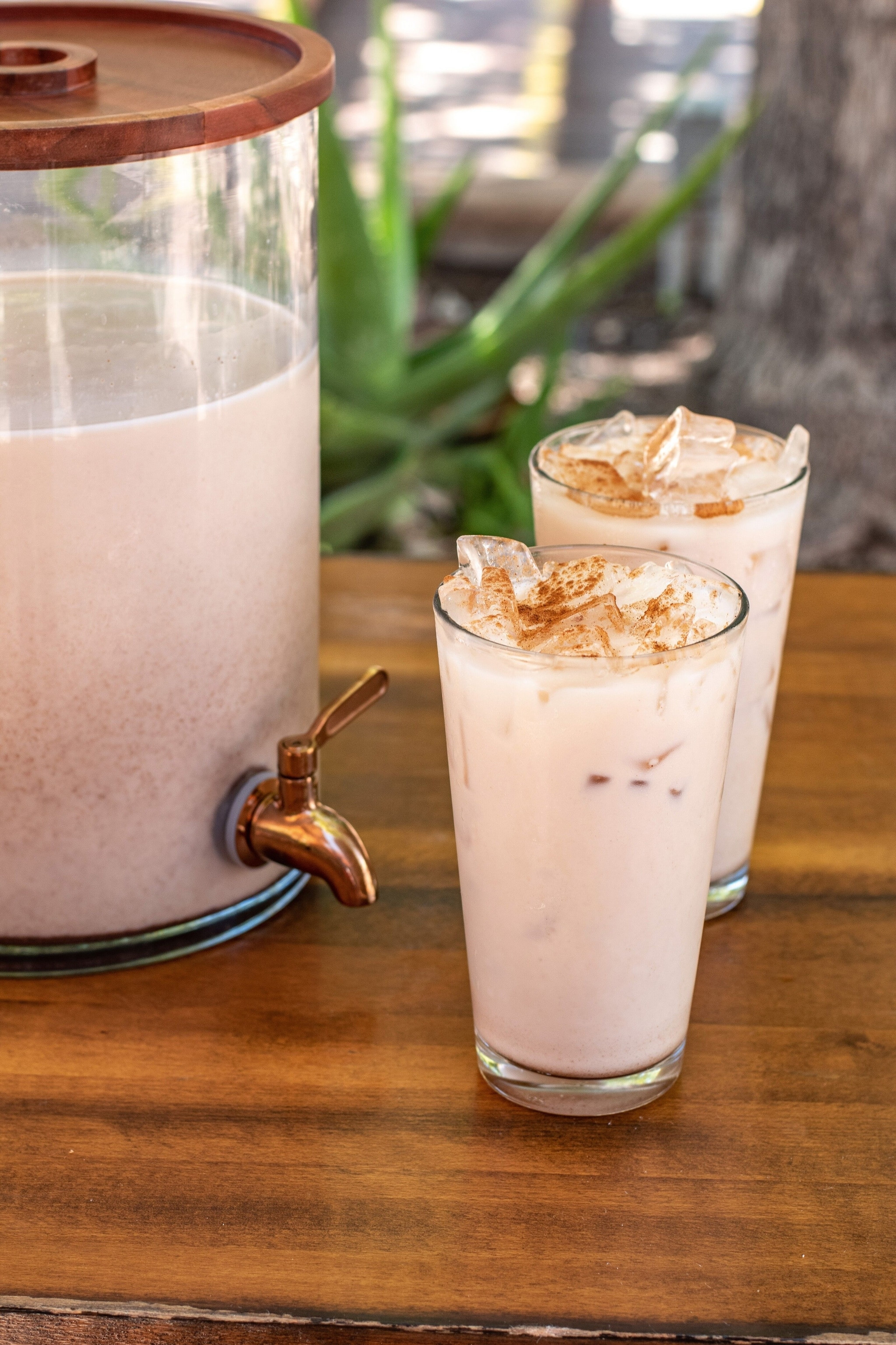 Refreshing housemade horchata at Seis Kitchen, highlighting the creamy texture and cinnamon spice.