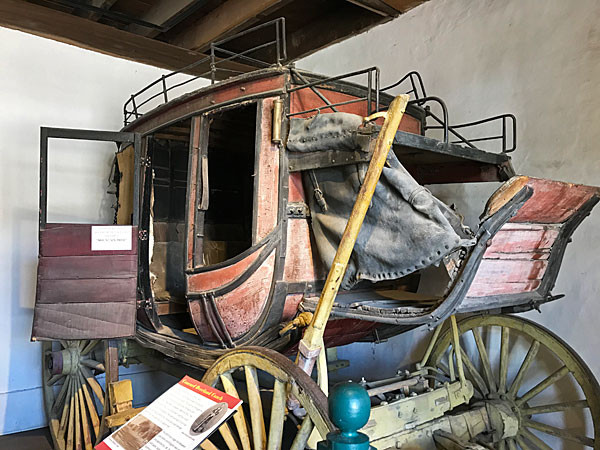 Stagecoach exhibit at the Courthouse Museum in Lincoln, New Mexico