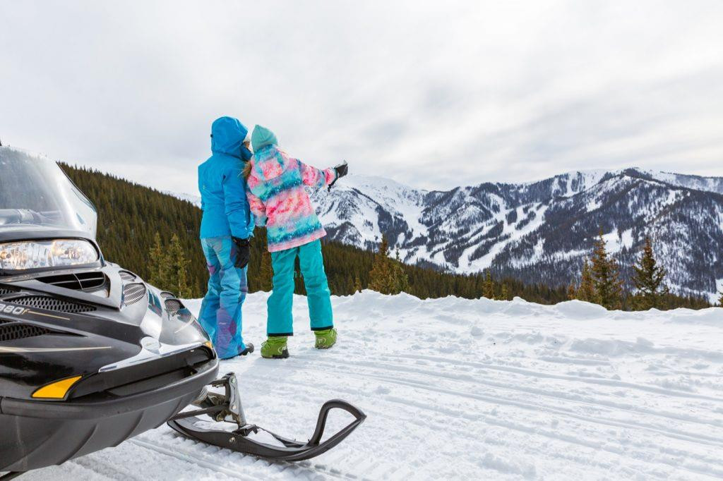 Thrilling snowmobiling adventure in the mountains of Taos Ski Valley