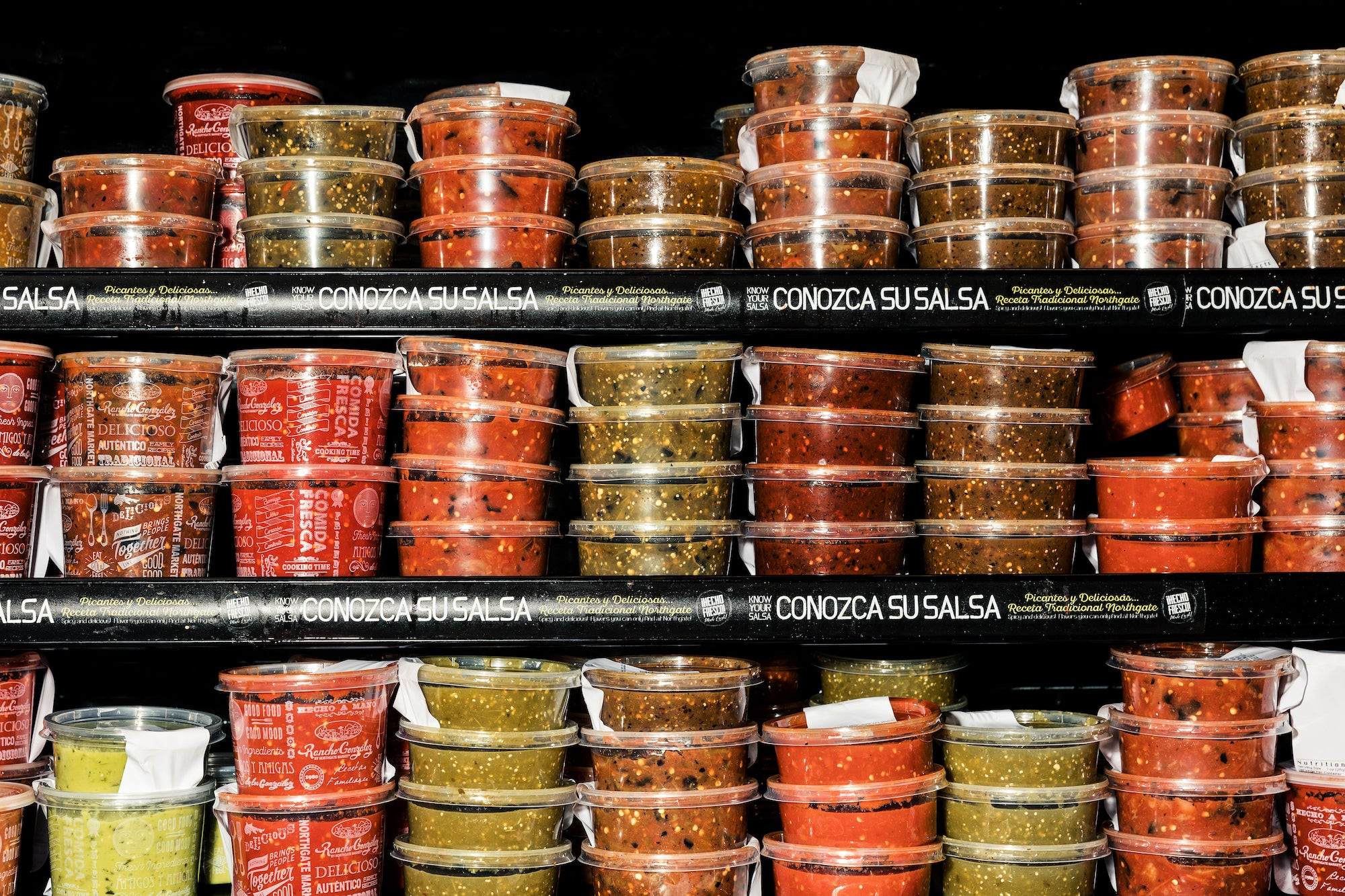 A vibrant display of fresh produce at Northgate Gonzalez Markets, highlighting the wide variety and quality available at Mexican grocery stores.