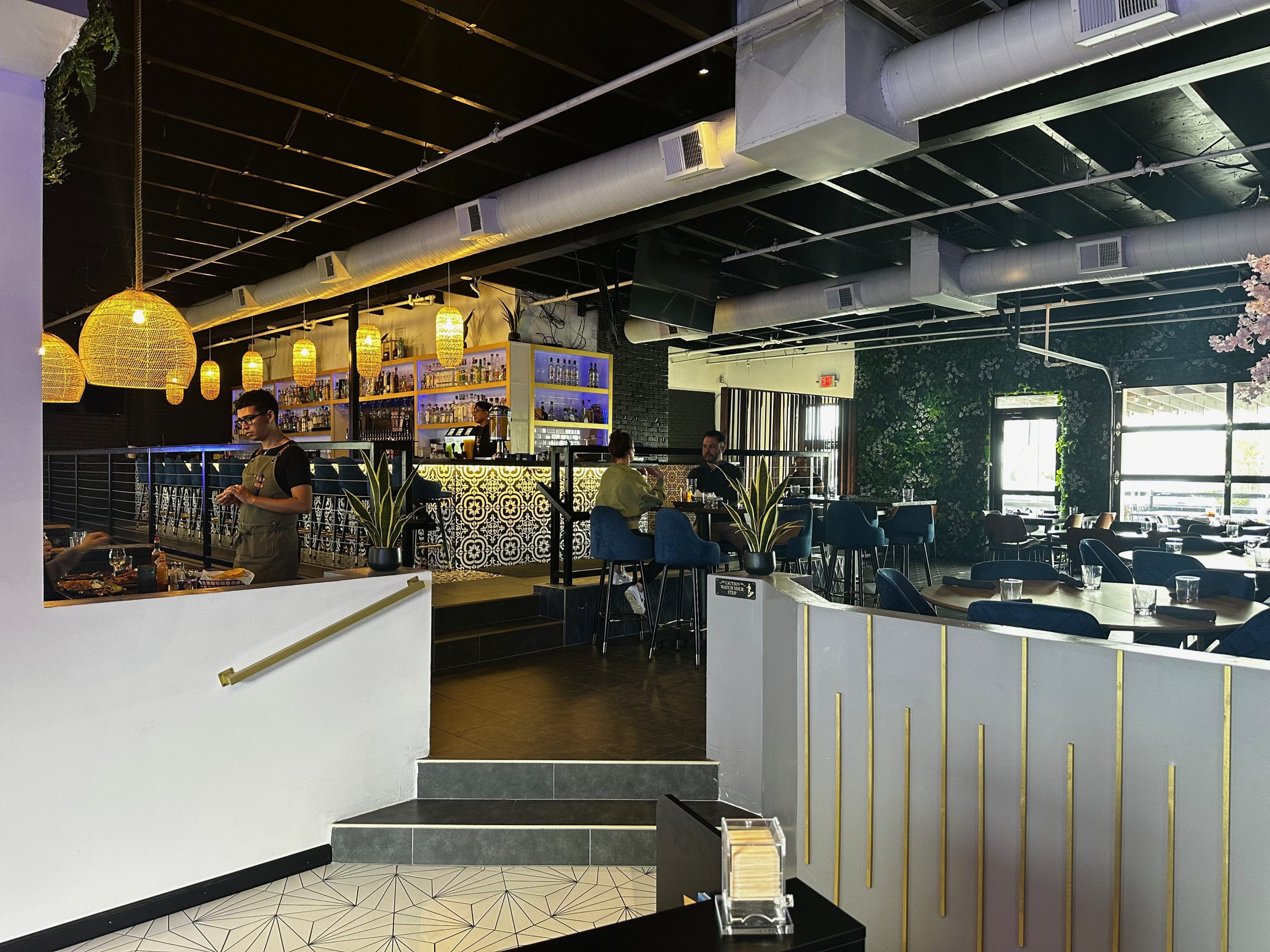 View of the Tequila Bar at Fiesta Azul, highlighting the upper level and server Xavier