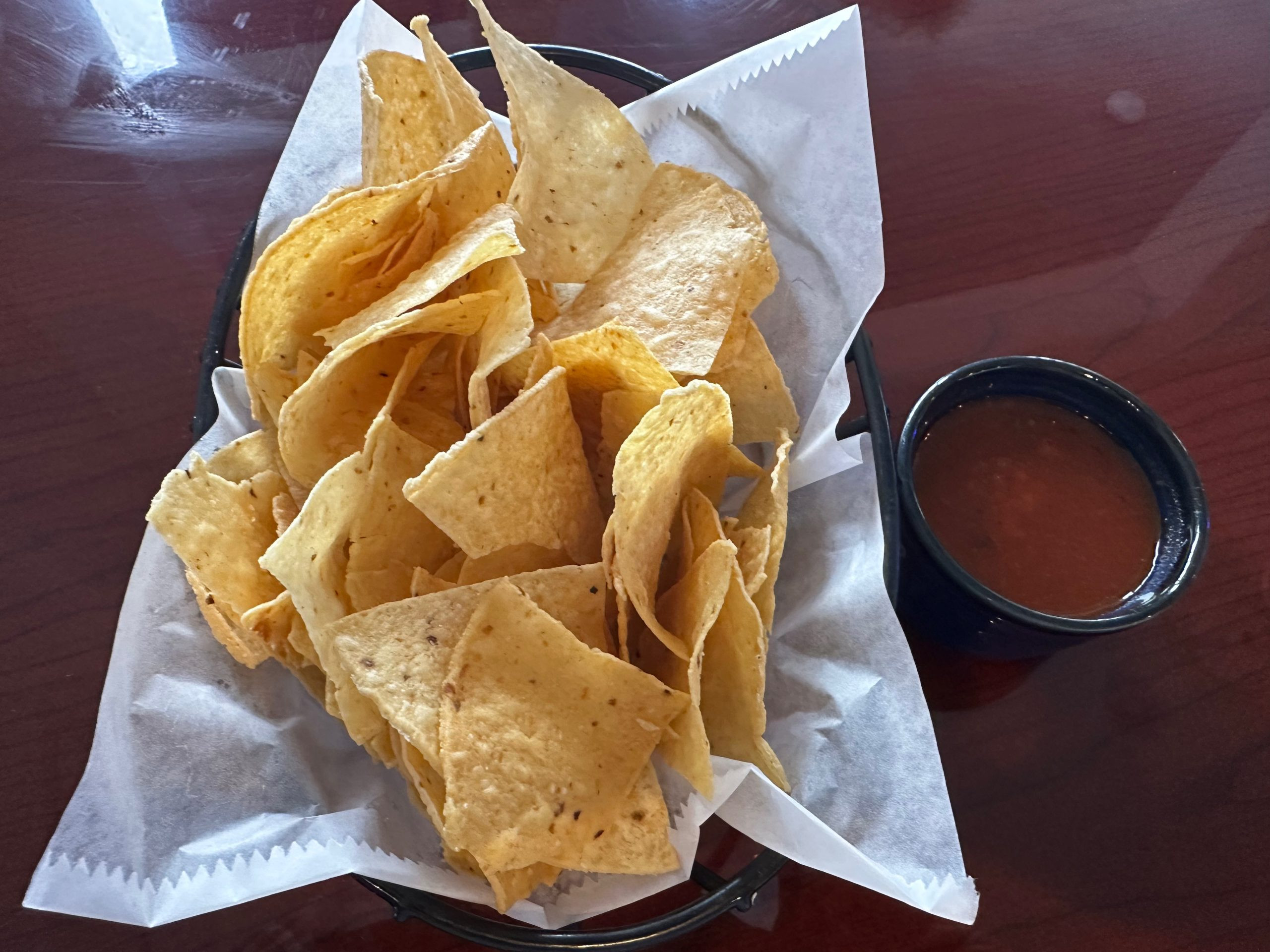 Complimentary salsa and chips at Fiesta Azul Tequila Kitchen, showcasing the restaurant's welcoming gesture