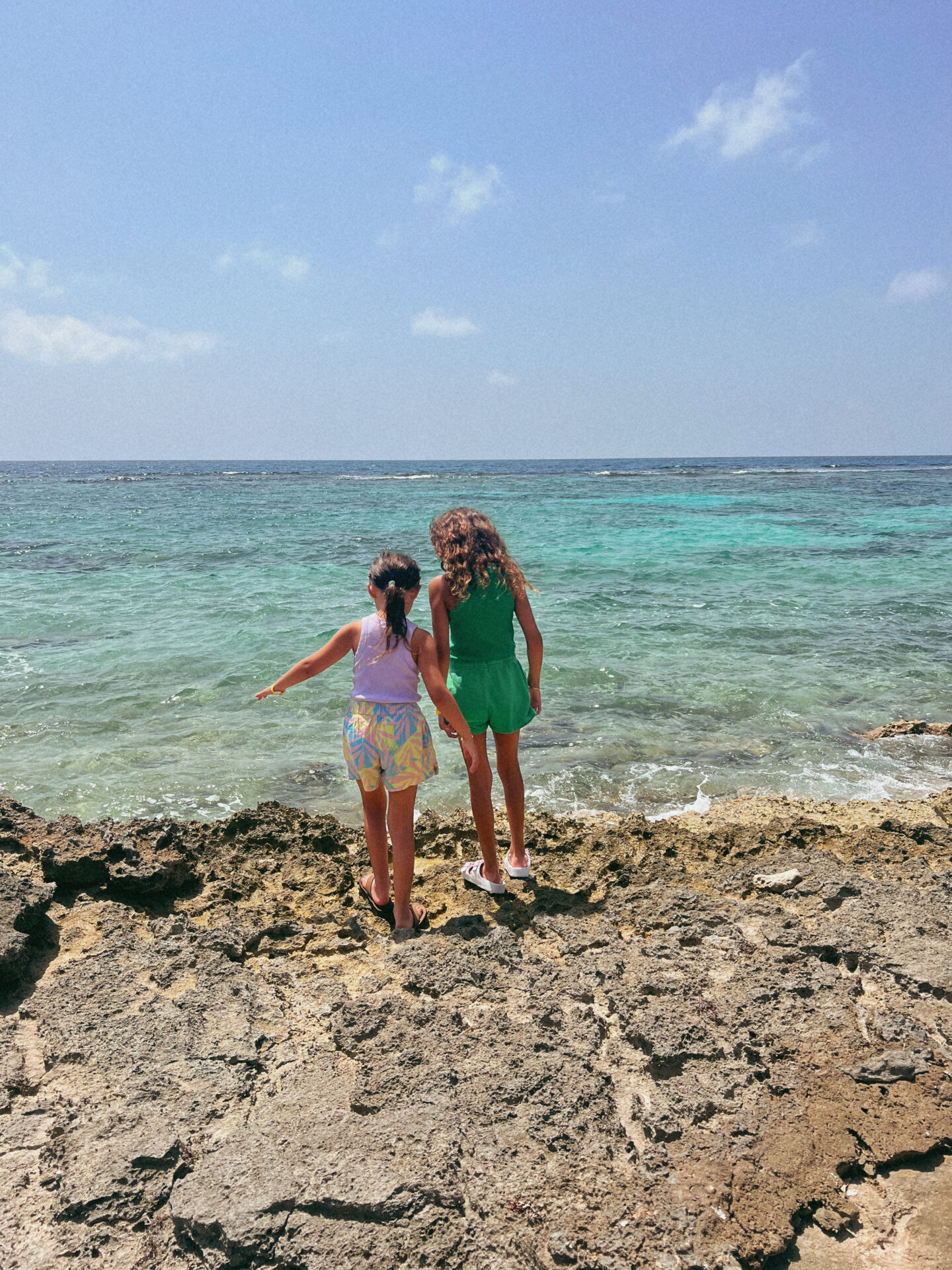 Smiling family enjoying the beach at Club Med Cancun, highlighting the resort's family-friendly atmosphere