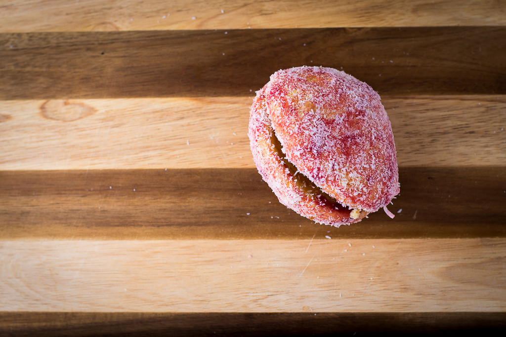 Yoyo/Ojo de Buey, two sweet breads with apple filling topped with strawberry jam and coconut at La Estrella Bakery Inc. (Credit: Jackie Tran)