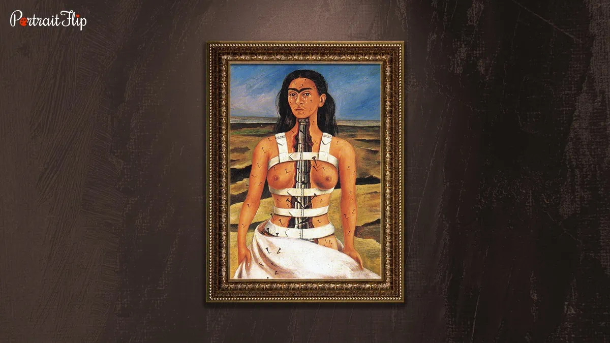 The Broken Column painting depicting Frida Kahlo in a desolate landscape, injured and vulnerable, yet resilient.