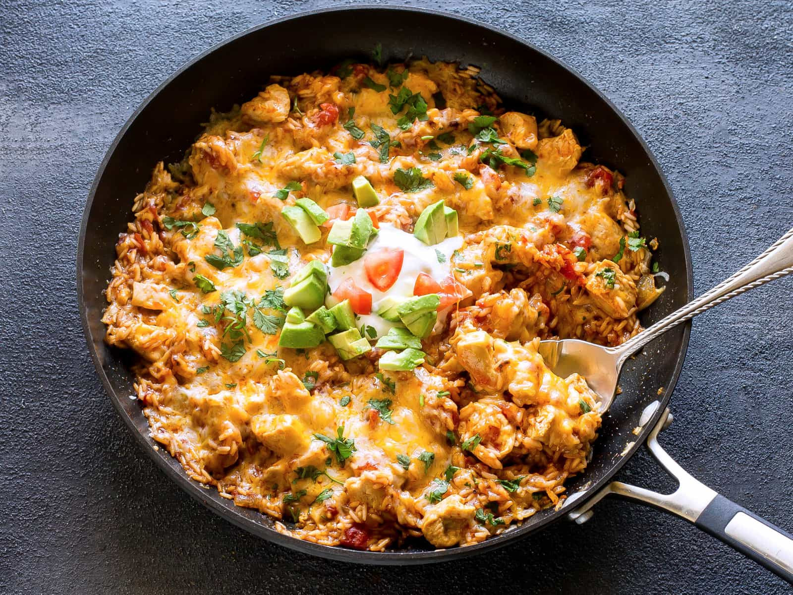 One Pan Mexican Chicken and Rice - an easy dinner ready in under 30 minutes! the-girl-who-ate-everything.com