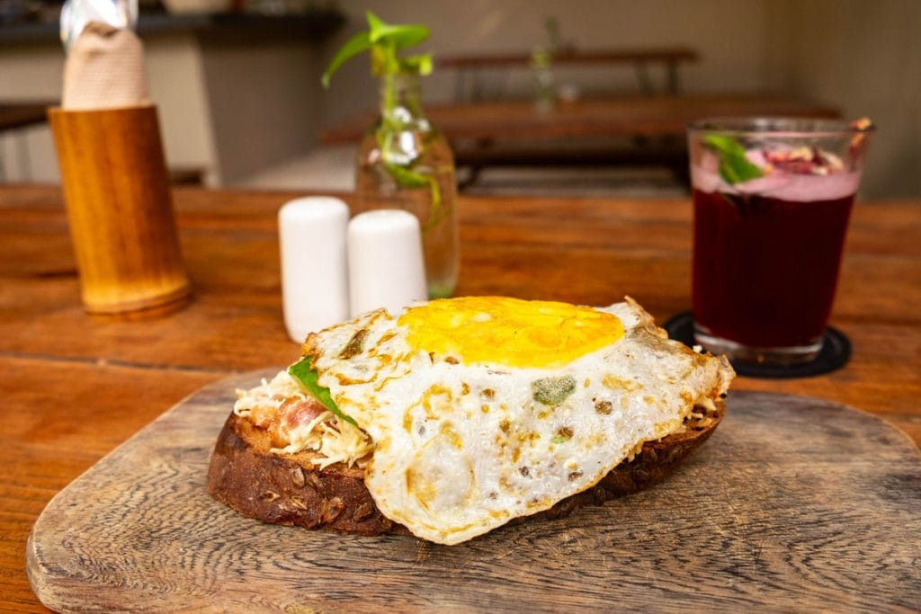 Chicken salad toast at BOTANICA Garden Cafe, Tulum