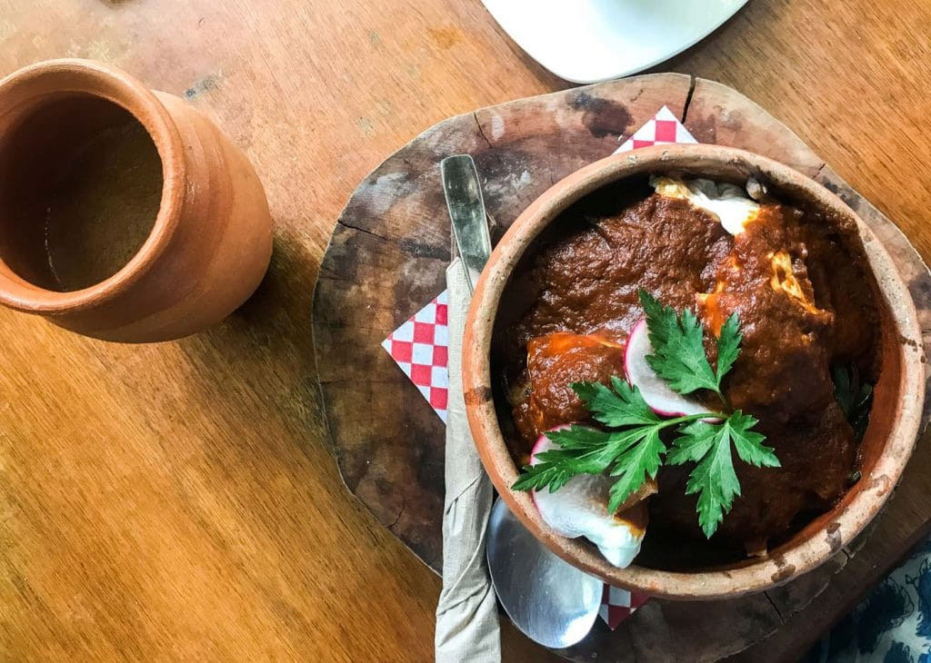 Mexican breakfast eggs in tomato sauce at Encanto Cantina, Tulum