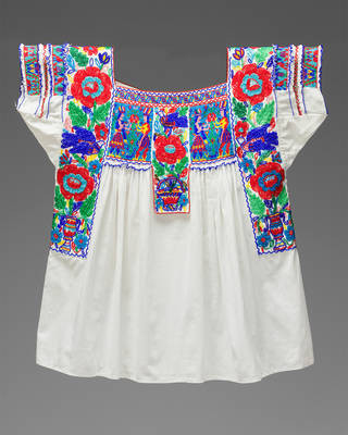 A beaded blouse from Puebla, featuring glass bead embroidery