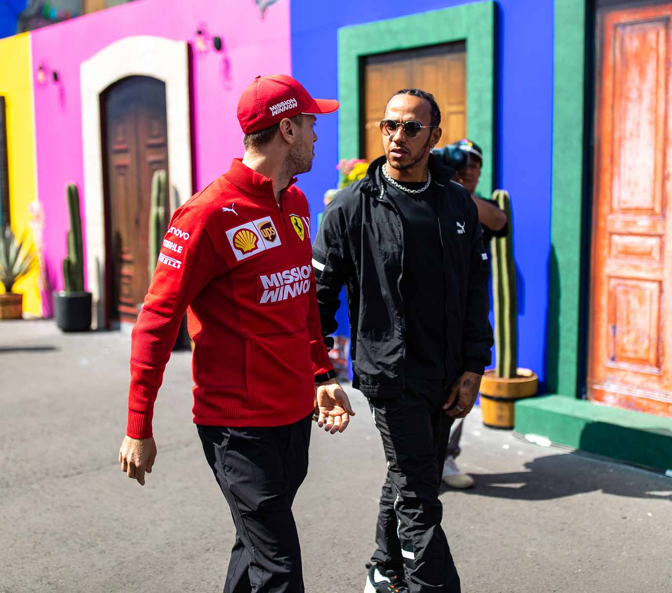 Sebastian Vettel in conversation after a press conference at the Mexican Grand Prix