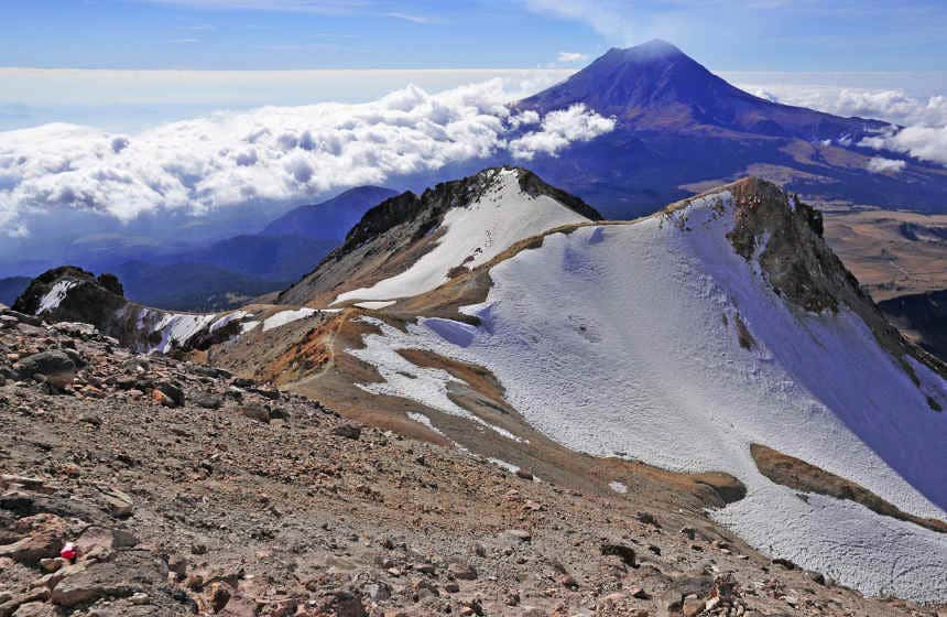 Majestic volcanoes Popocatépetl and Iztaccíhuatl in Puebla, central Mexico, steeped in indigenous mythology and legends.