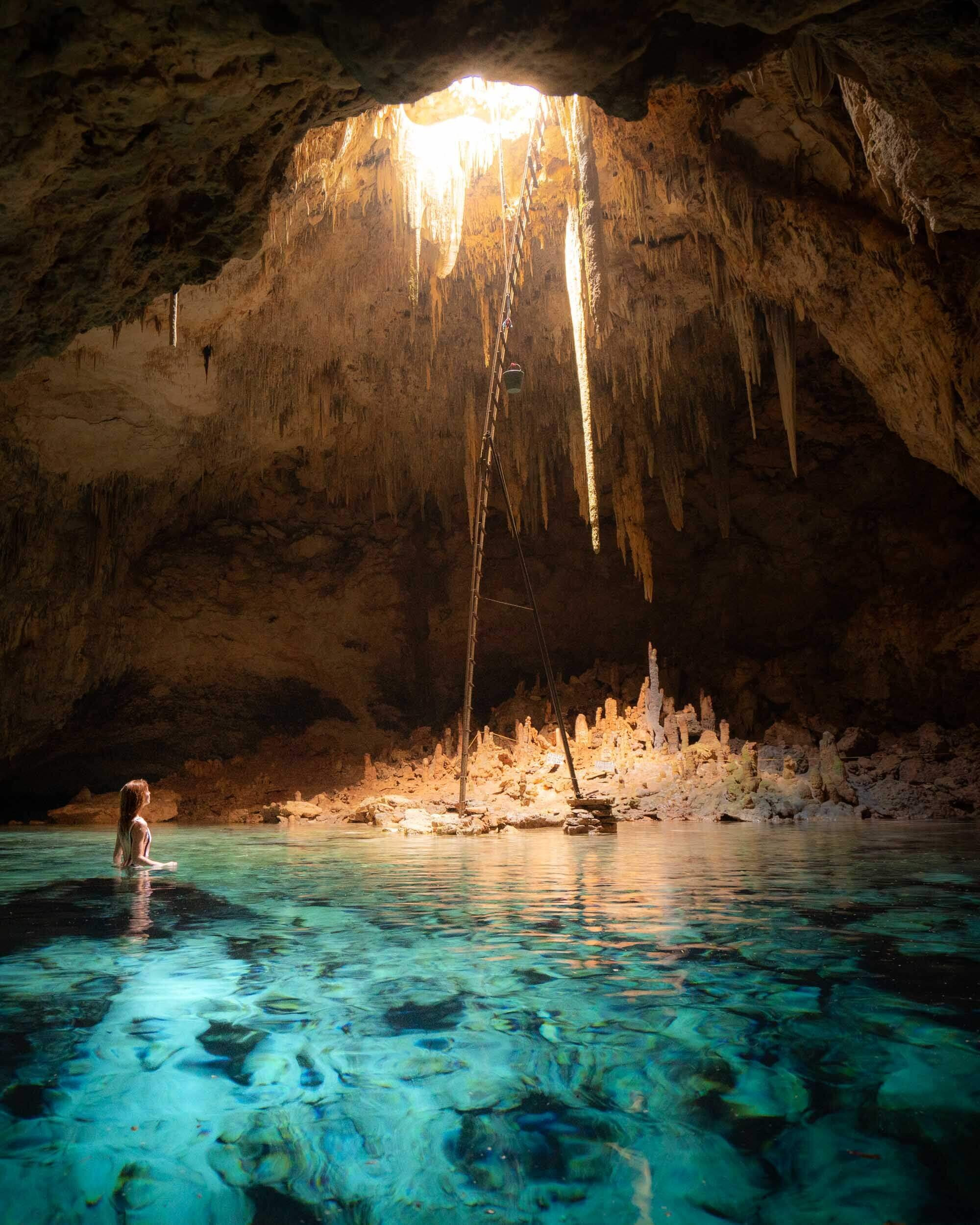 Cenote Aktun Ha, nestled in the backyard of a local residence near &quot;Los 3 cenotes de Cuzama&quot;, Yucatan Peninsula, Mexico.