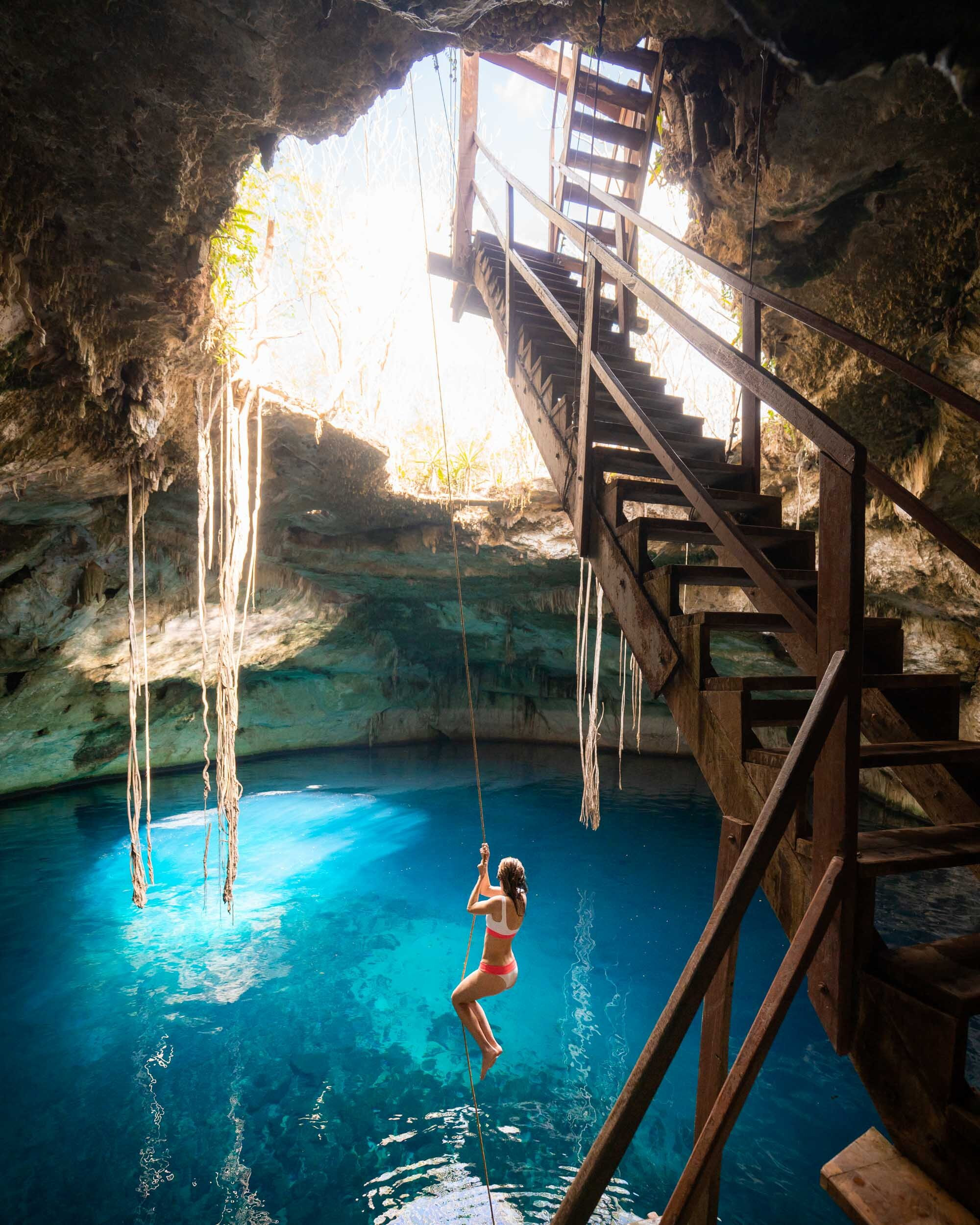 The breathtakingly clear water of Cenote Noh-Mozon near Merida, a highlight of any Yucatan cenote adventure.