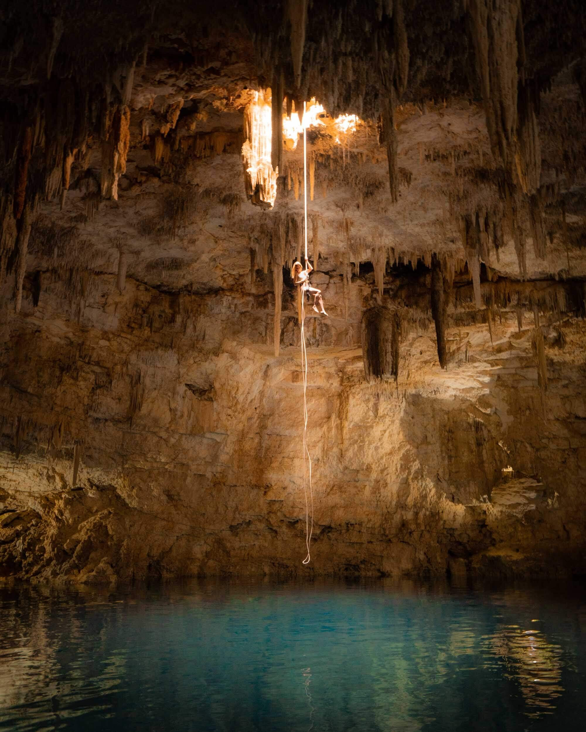 Consider the thrilling option to rappel into the depths of Cenote Palomitas, Yucatan Peninsula, Mexico.