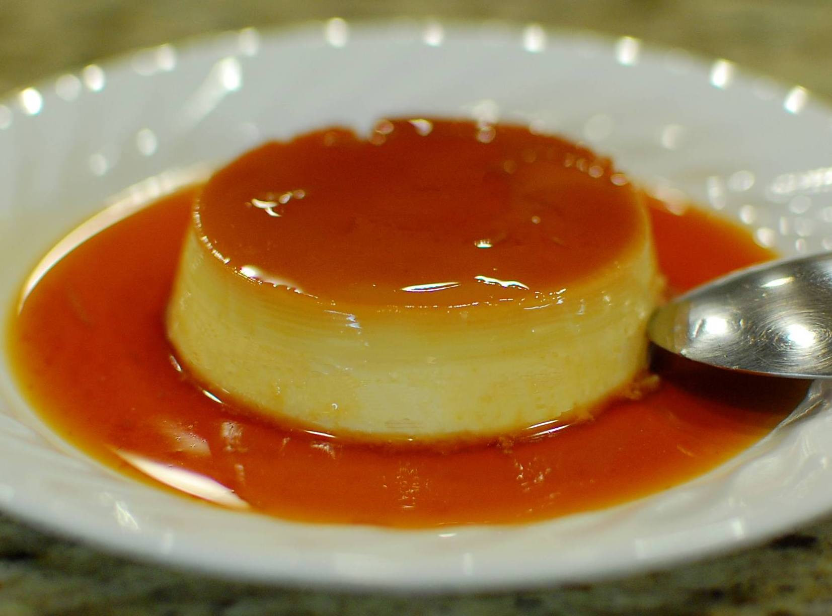 Overcooked flan with a curdled texture.