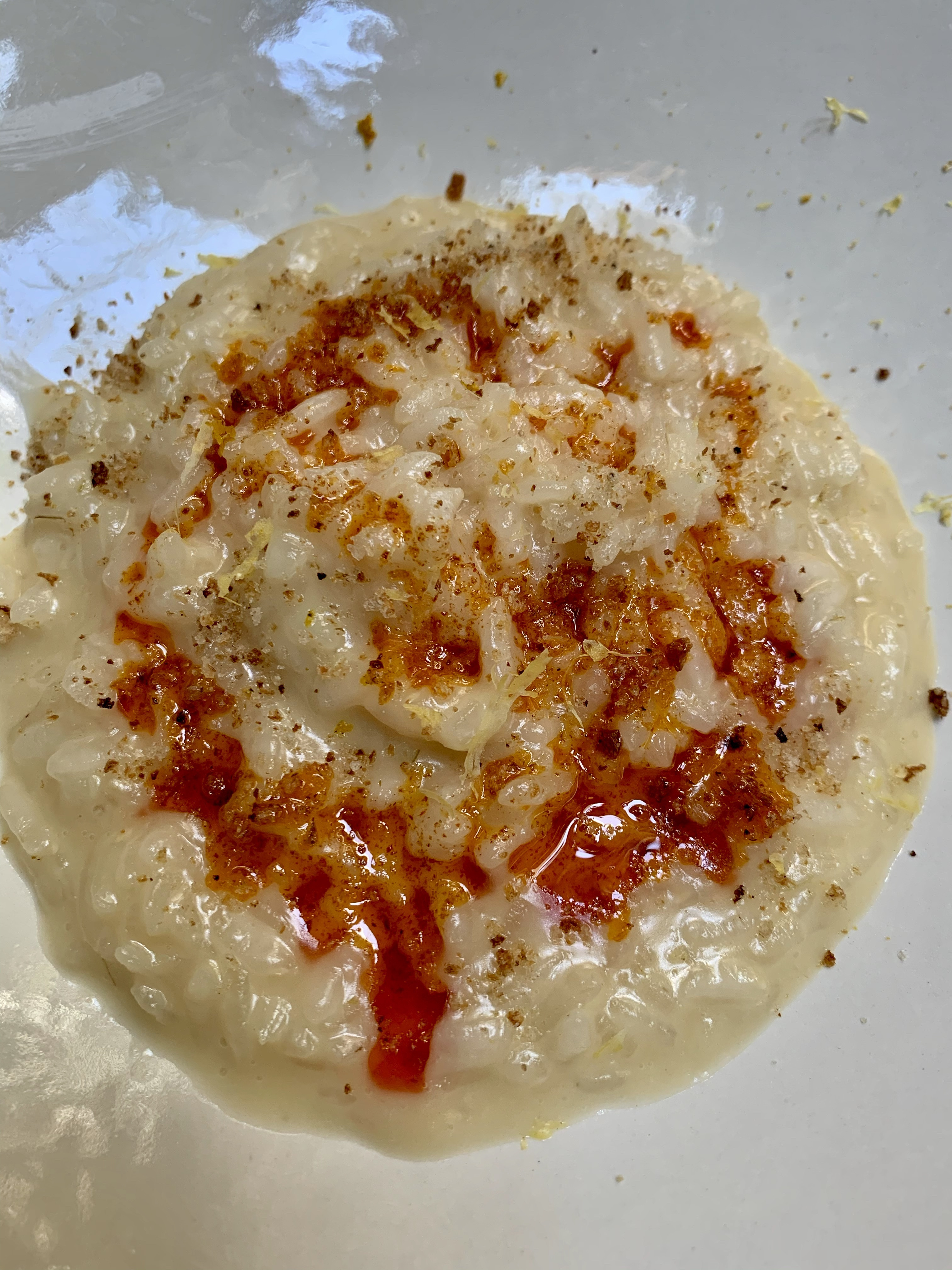 Risotto with 'njuda and orange, a fresh corn tamal, and a unique dessert.