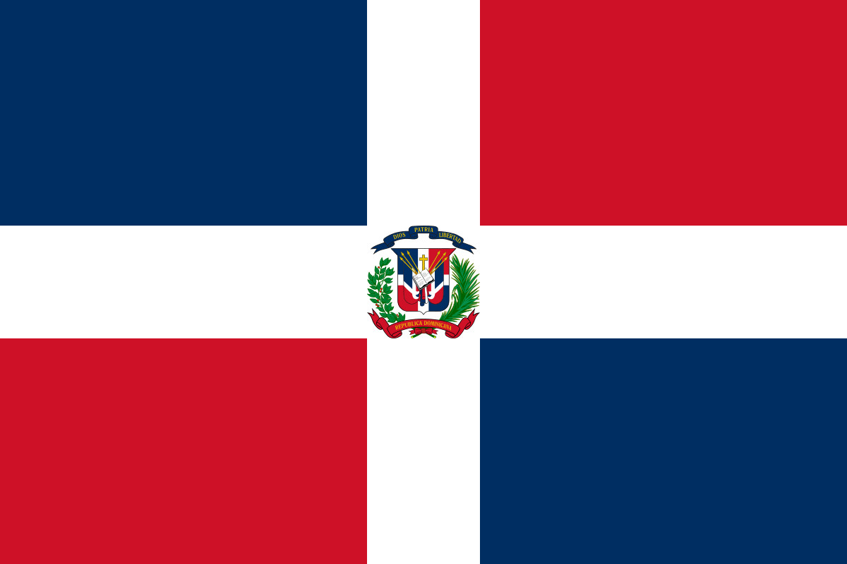 Dominican Republic flag waving in the breeze, representing the country of origin for travelers to Mexico