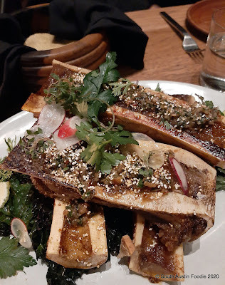 Grilled bone marrow at Comedor restaurant with fresh tortillas