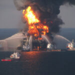 Fire boat response crews battle the blazing remnants of the offshore oil rig Deepwater Horizon image