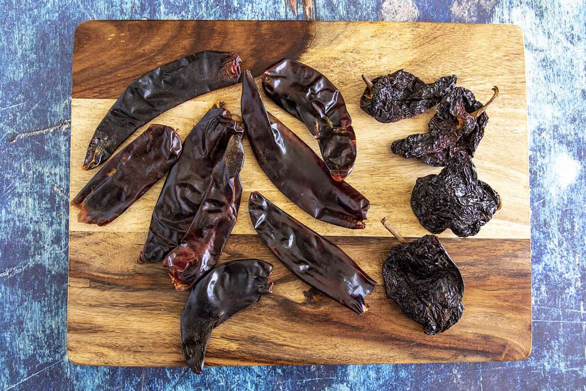 A vibrant display of dried chilies, essential for creating authentic Mexican adobo sauce, capturing the essence of Mexican culinary heritage.