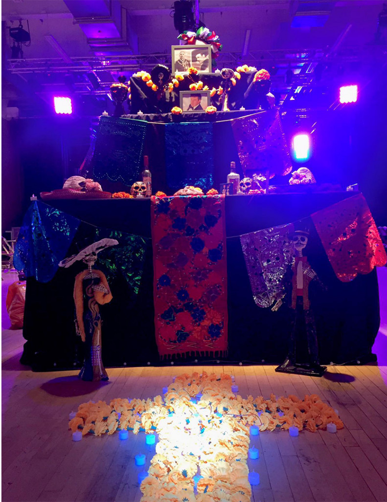 University of Bristol students creating a Day of the Dead offering, paying tribute to iconic Mexican artists from the golden era, showcasing cultural appreciation and remembrance.