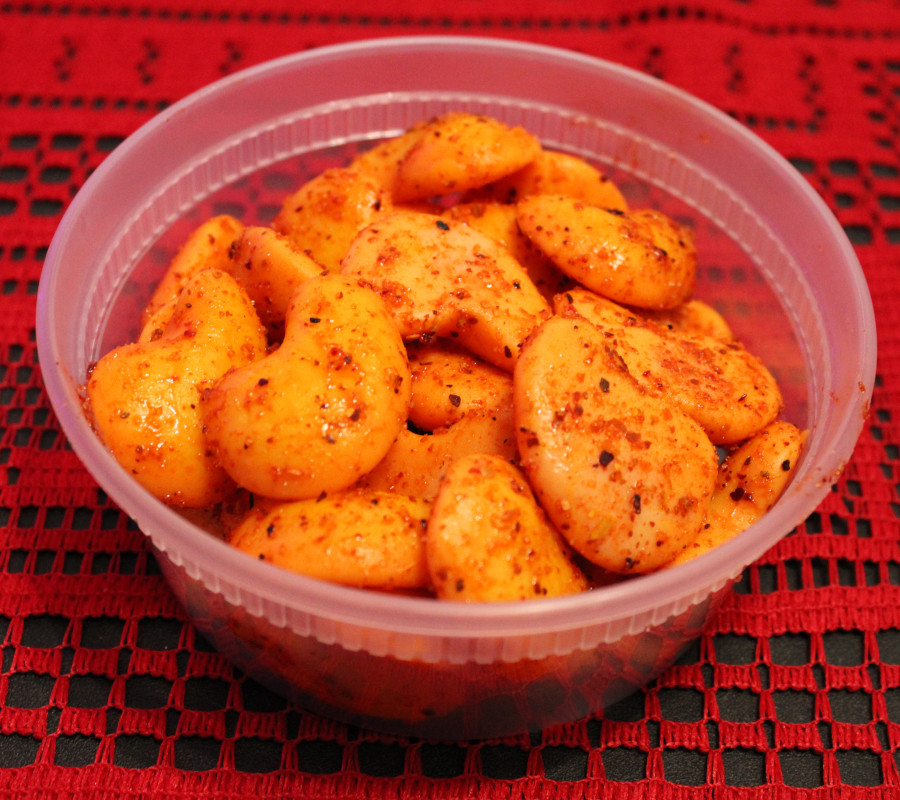 Mother and child enjoying spicy snacks together