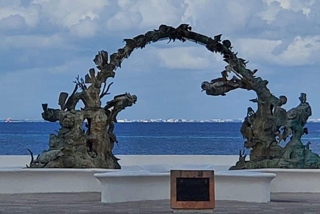 Sculpture in front of ocean in Cozumel