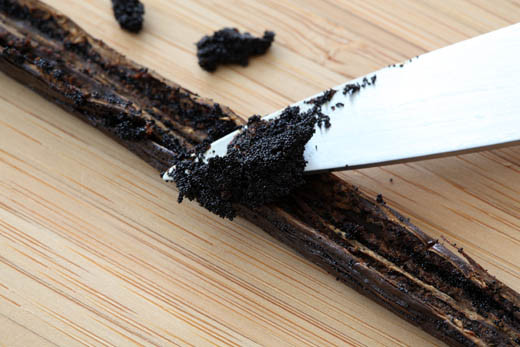 Vanilla bean cut open to reveal seeds