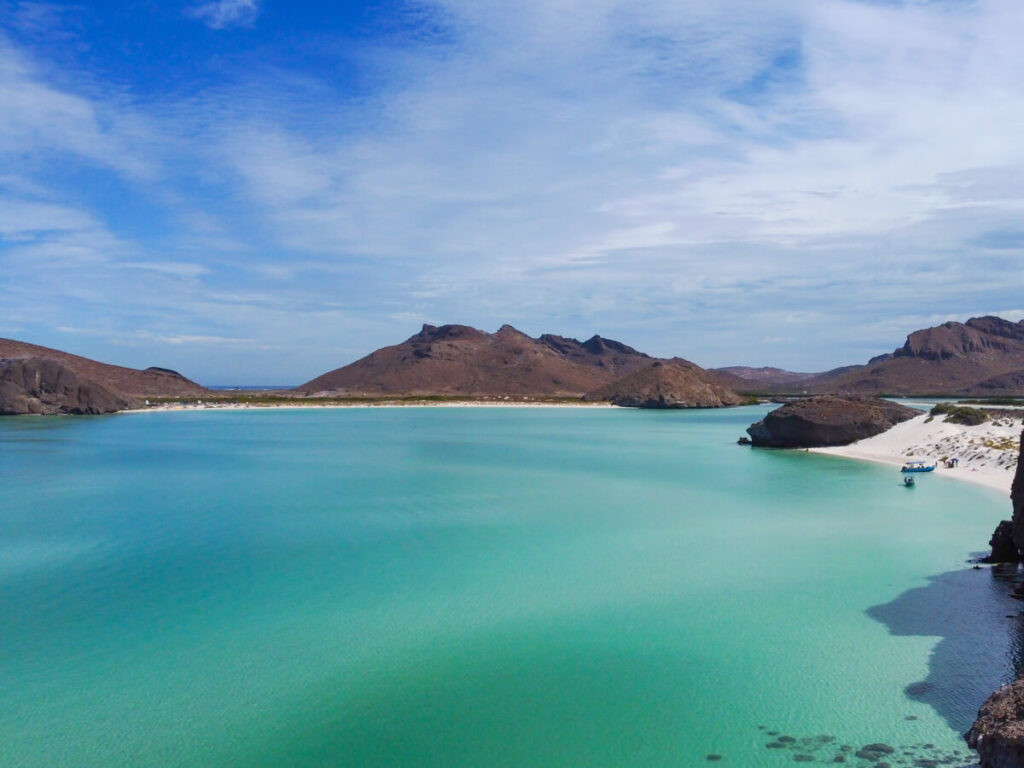 Drone view of the beaches of Balandra Bay, La Paz, Mexico, showcasing its turquoise waters and white sand.