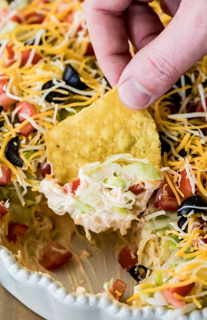 Taco Dip with various toppings.