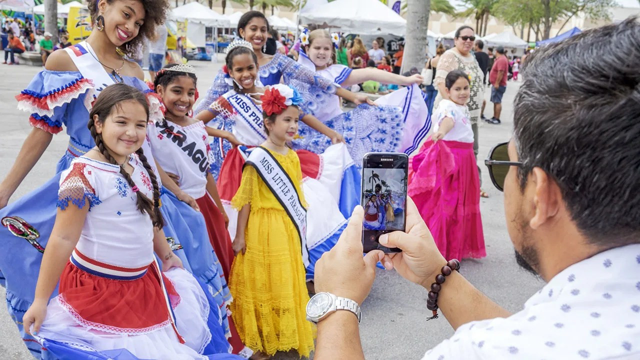 Beauty pageant contestants at the Junta Hispana Hispanic cultural festival in Miami