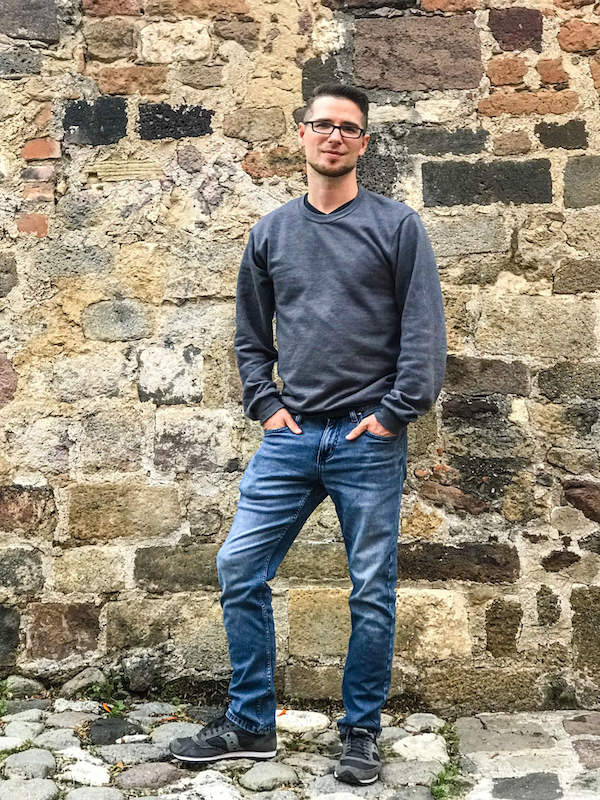 Jim wearing a sweatshirt and jeans in Tlaxcala, Mexico in July