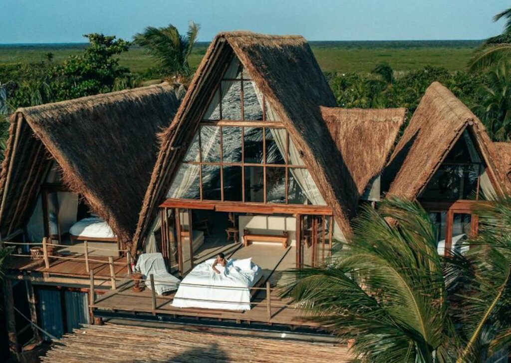 A luxurious hotel room at La Valise Tulum, offering a relaxing and stylish stay