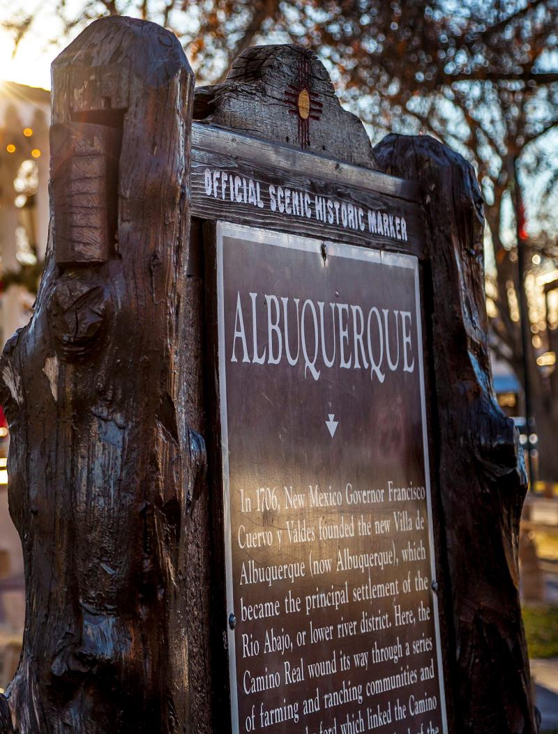 Historic marker sign explaining Albuquerque's name and history