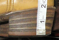 Frye boots with intricate stitching and detailing